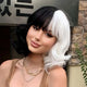 Cruella Black and White Wavy Mid-Length Cosplay Wig with Bangs